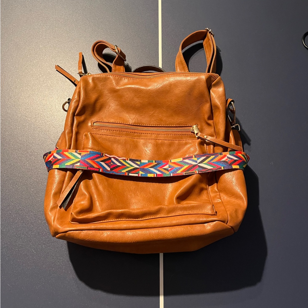 Brown Leather Backpack with Colorful Strap